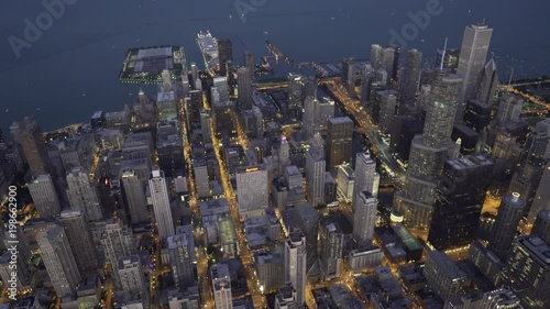 Chicago aerial view rotating around the Chicago loop with focus on Trump Tower at dusk