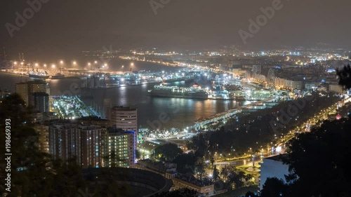 Wallpaper Mural Night timelapse over the city of Malaga Torontodigital.ca
