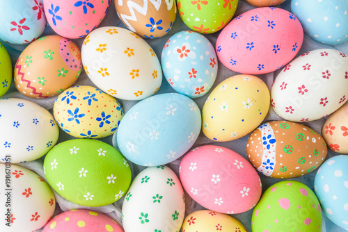 Happy easter! Closeup Colorful Easter eggs background. Happy family preparing for Easter.