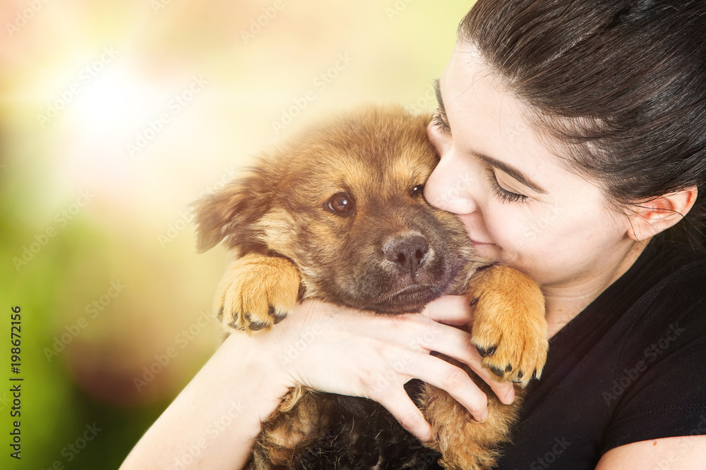 Beautiful Young Woman Holding Cute Puppy Outdoors Beautiful Young Woman Holding Cute Puppy Outdoors