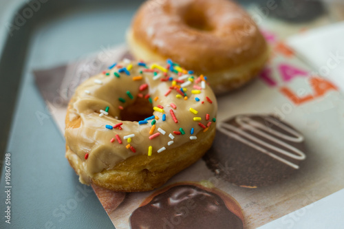 Slika na platnu Two doughnuts on a table