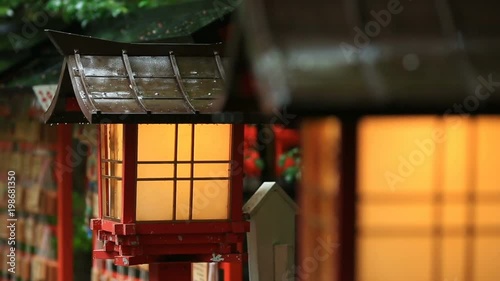 Japanese temple lanterns in rainy weather.