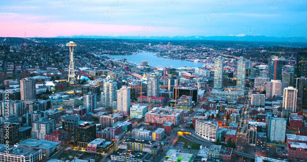 Fototapeta premium Seattle Panoramic South Lake Union Buildings Under Construction Center Growing City Sunset Red Clouds Aerial View Looking North