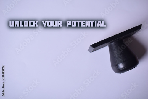 Stamp on paper:UNLOCK YOUR POTENTIAL