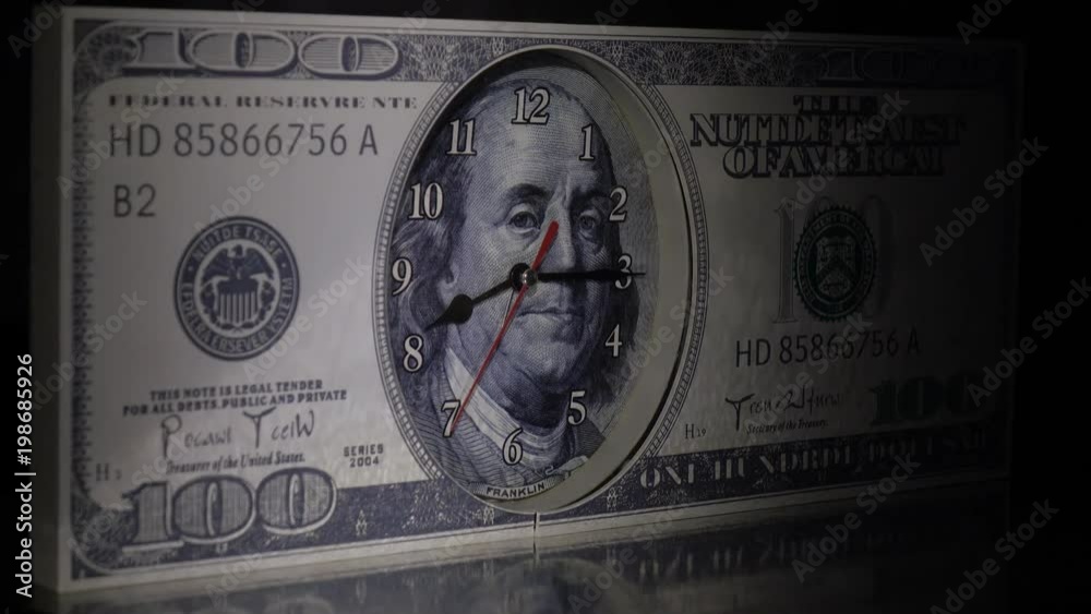 Watch the hundreddollar bill.Time is money.Ray of light. Stock Video Adobe Stock