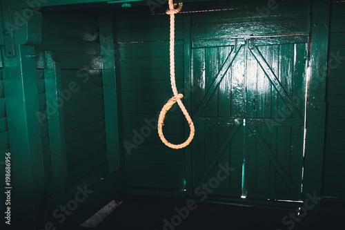 loop of white rope on a black background
