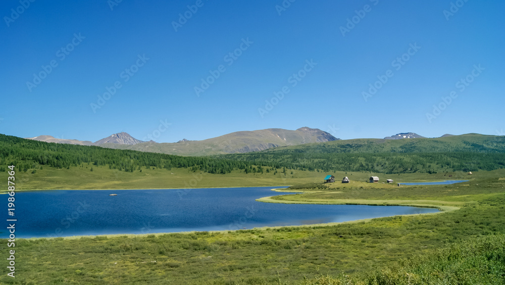 Blue water mountain lake landscape, Altay republic, Russia Blue water mountain lake landscape, Altay republic, Russia