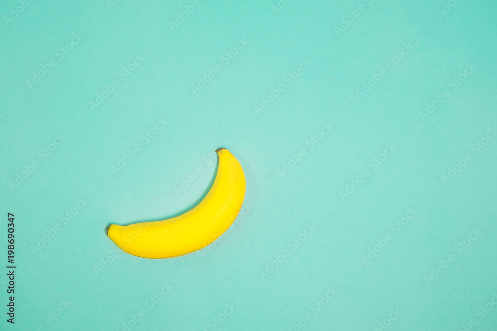 Single banana on color background., From top view. Single banana on color background., From top view.