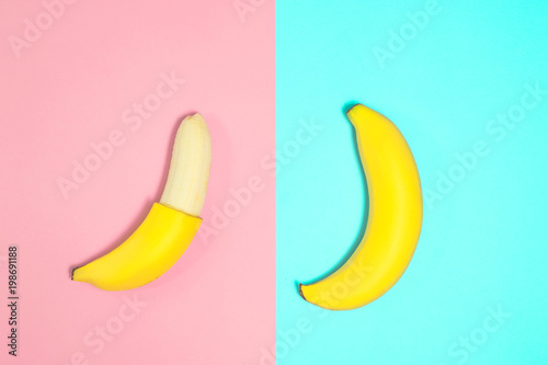 Single banana on color background., From top view.