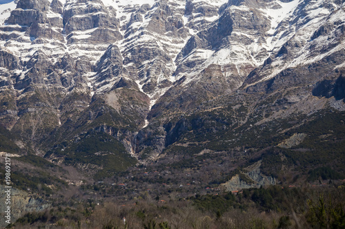 Tzoumerka mountain peaks  in spring time,  snow on the top, epirus greece , for travel background photo