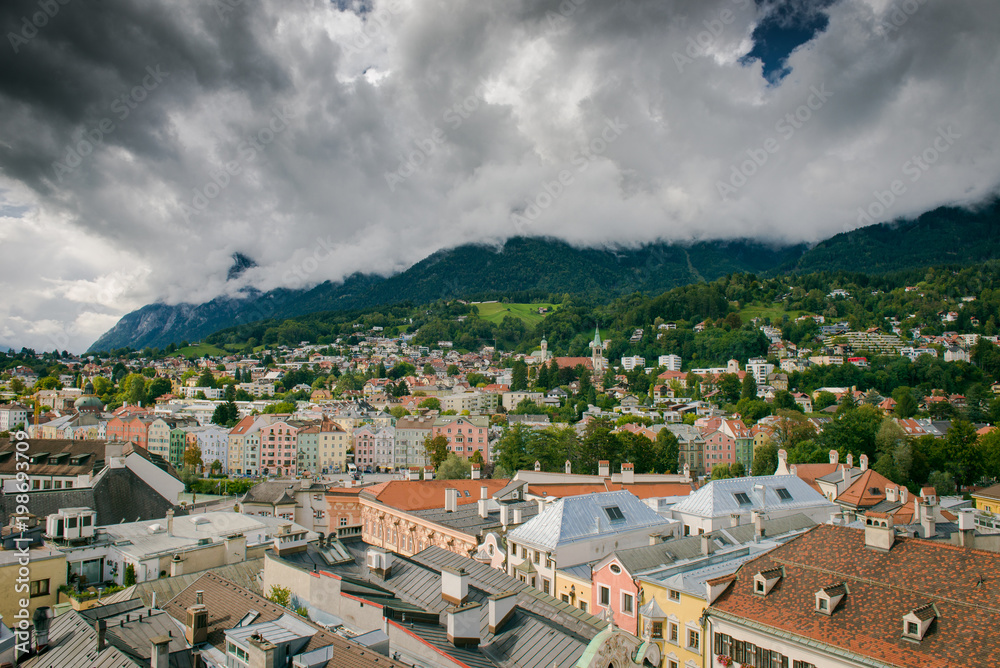 Innsbruck, Austria. View from the tower. Top view of the city. Sky with clouds above the beautiful city.

