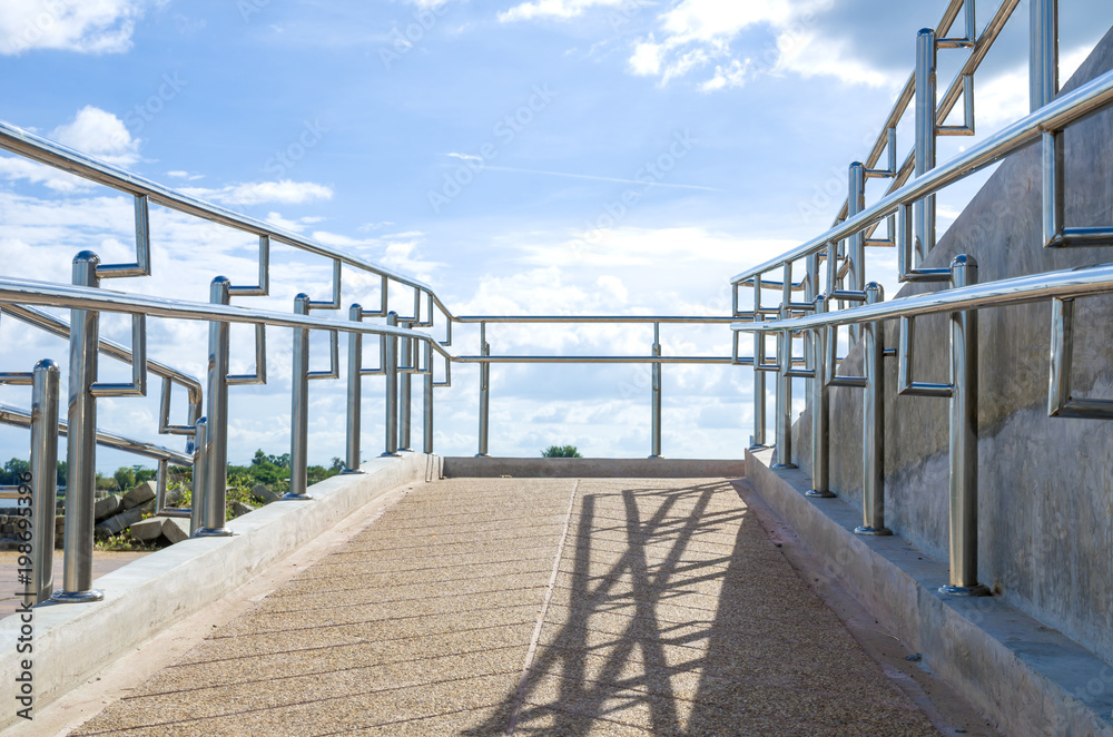 Naklejka premium Way down or ascent a ramp for wheelchairs 