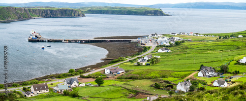 View of the town Uig with it's harbour connection to the outer hebrides photo