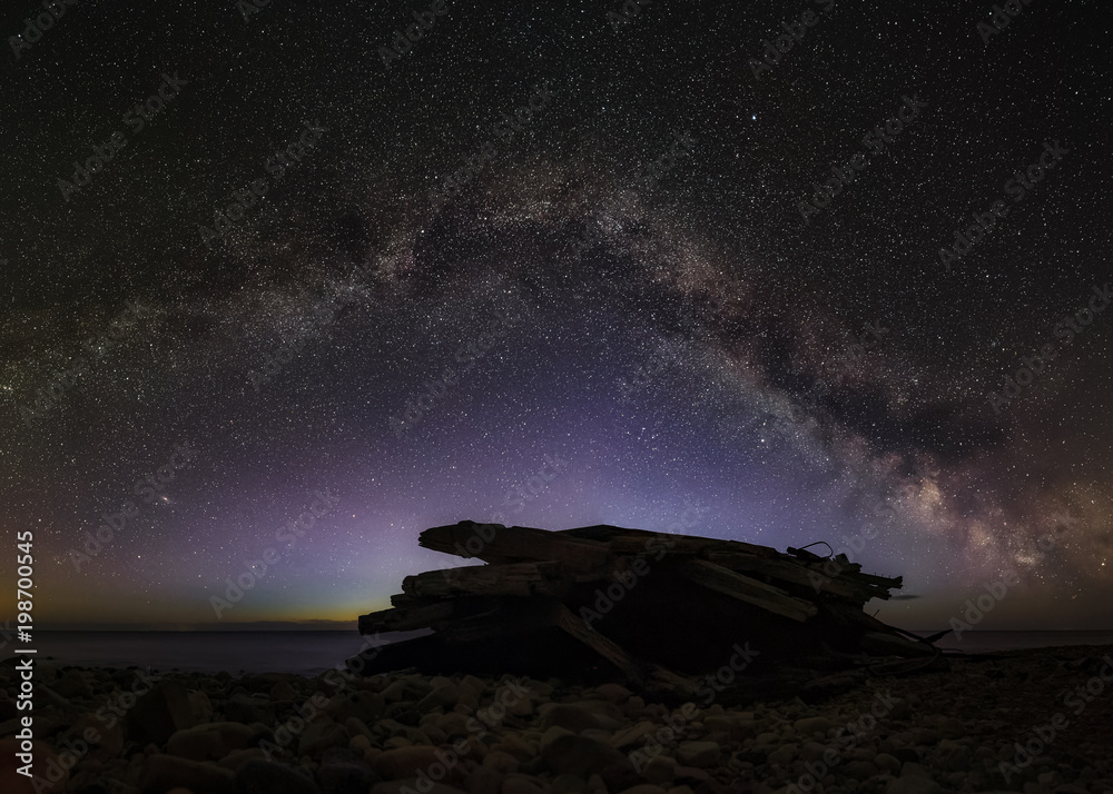 The wreckage of Swiks with the Milky way above