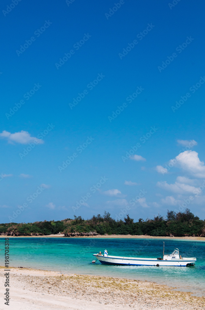 White sand beach crystal clear turquoise water at Kabira Bay, Ishigaki, Okinawa