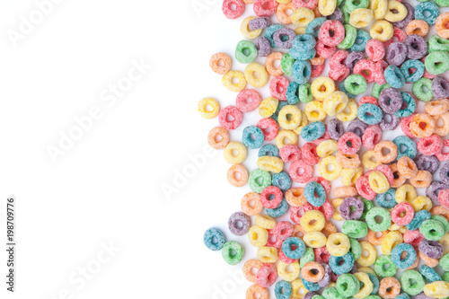 Fotografie Multicolor cereals with fruity on white background.