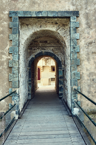wooden bridge and gate of the medieval fortifications in Saint Tropez © GKor