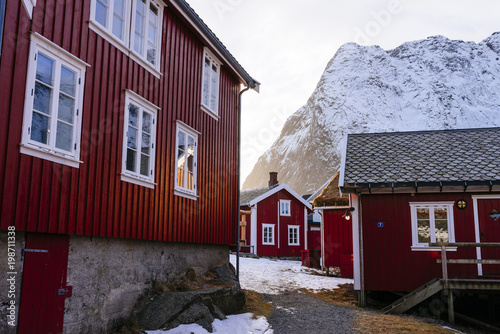 Fotografie red wooden houses in the arcticvillage of Reine/ Lofoten/Norway/ Europe