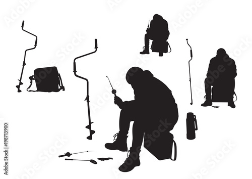 The silhouette of the fisherman on winter fishing. The lifestyle of Fishermen in the winter.