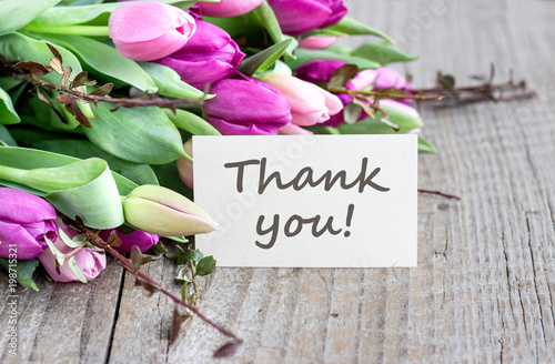 Thank you / 
bouquet with pink and violet tulips and card with text: Thank you