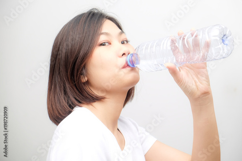 Healthy life of asian beautiful women drinking pure water