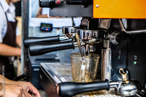 Cafe barista making coffee preparing machine