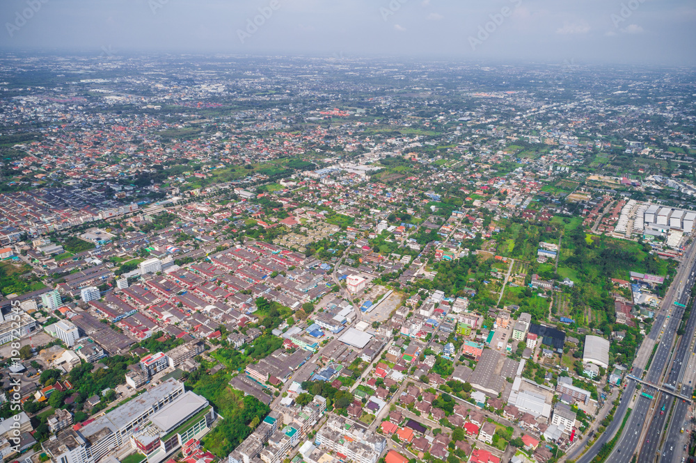 Aerial view of modern city traffic road with building