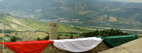 view from the fortress of San Leo with Italian tricolor