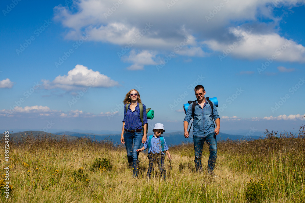 The family travels in the mountains