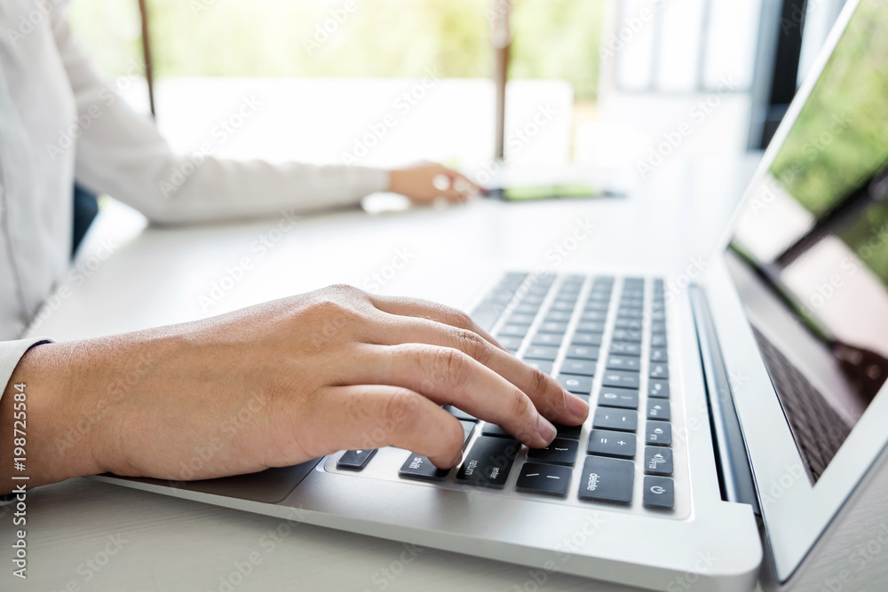 Business woman working and using laptop computer, digital tablet, business and technology concept Business woman working and using laptop computer, digital tablet, business and technology concept
