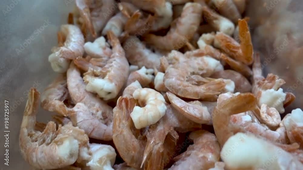 Fresh frozen shrimp, moving camera, close-up Fresh frozen shrimp, moving camera, close-up