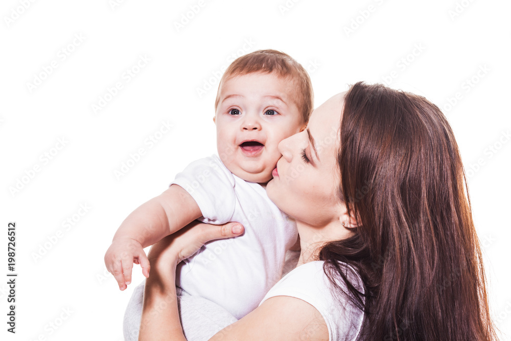 Mother kiss her baby isolated