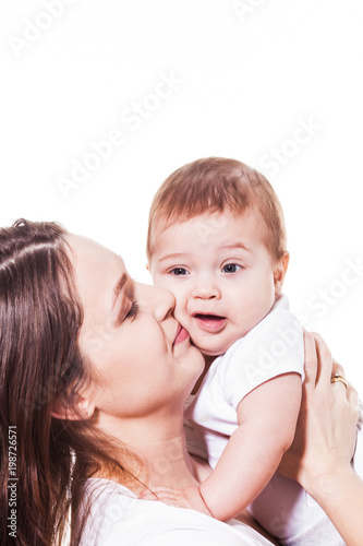 Mother hugs her baby isolated