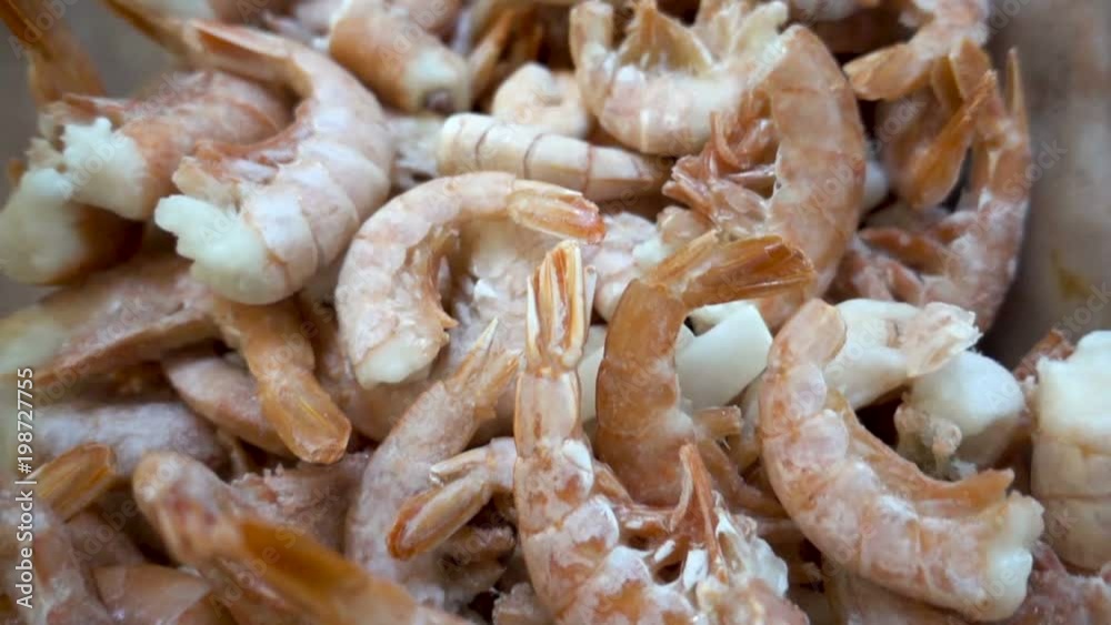 Fresh frozen shrimp, moving camera, close-up Fresh frozen shrimp, moving camera, close-up