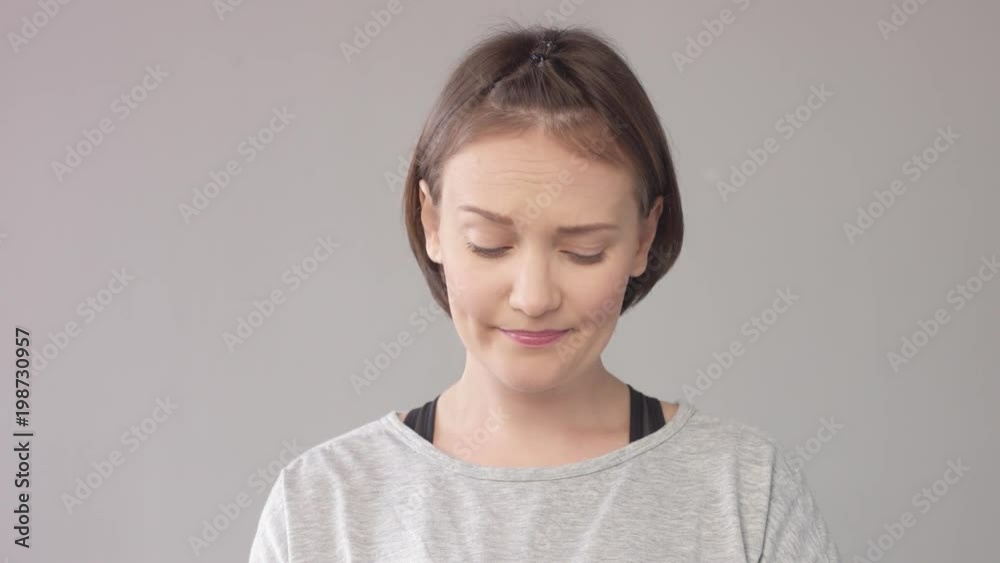 disappointed woman, feeling guilty, Sorry woman on grey disappointed woman, feeling guilty, Sorry woman on grey