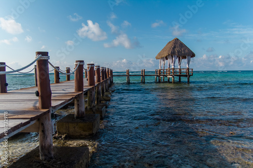 A wooden dock on the Caribbean Sea in Mexico  Yucatan. Waves