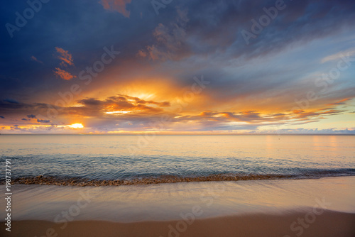 Fototapeta Naklejka Na Ścianę i Meble -  Tropical beach at sunset