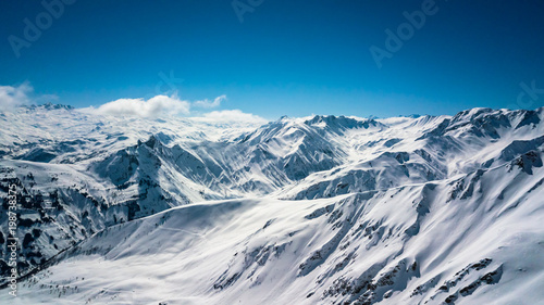 Drone view of the alps with sunny weather clear skies  photo