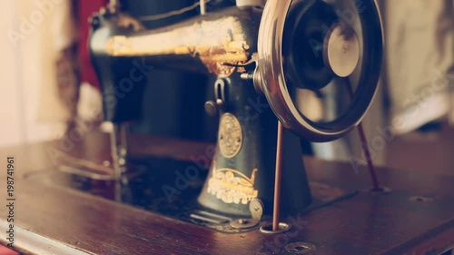 Close up of vintage sewing machine. Retro style sewing tinted footage