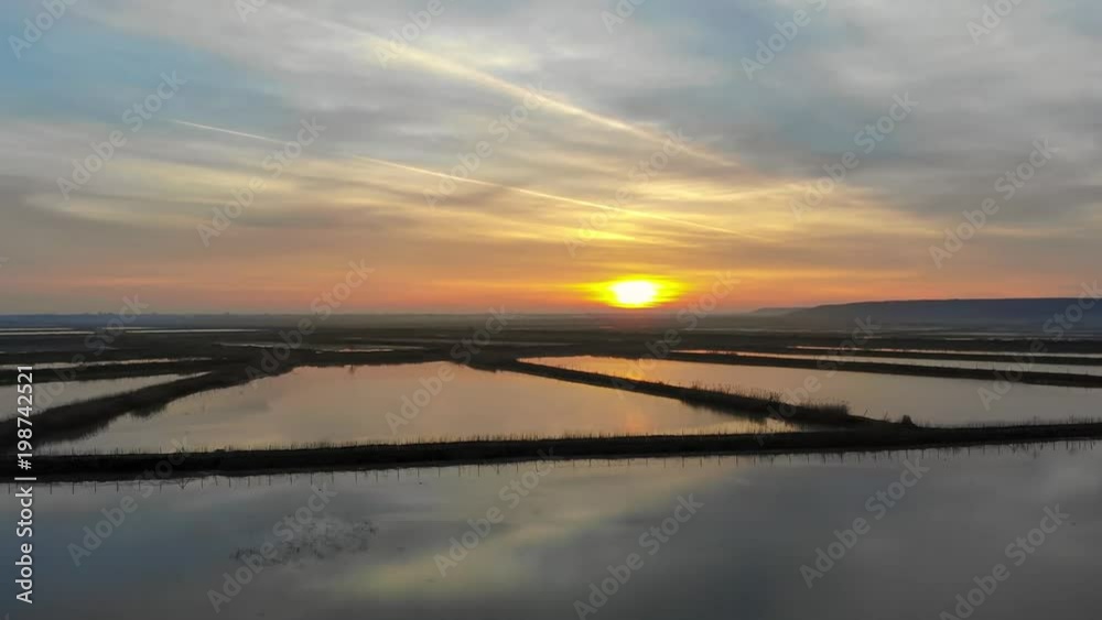 Sunset over wetlands. Spring floods in Neajlov Delta, Comana, Romania. Sunset over wetlands. Spring floods in Neajlov Delta, Comana, Romania.