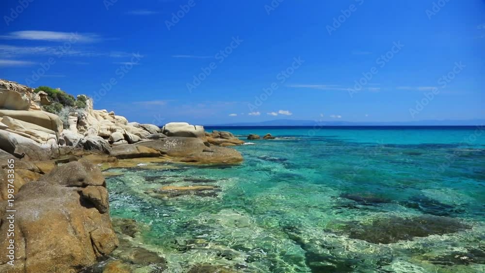 Greece rock breach in summertime Greece rock breach in summertime