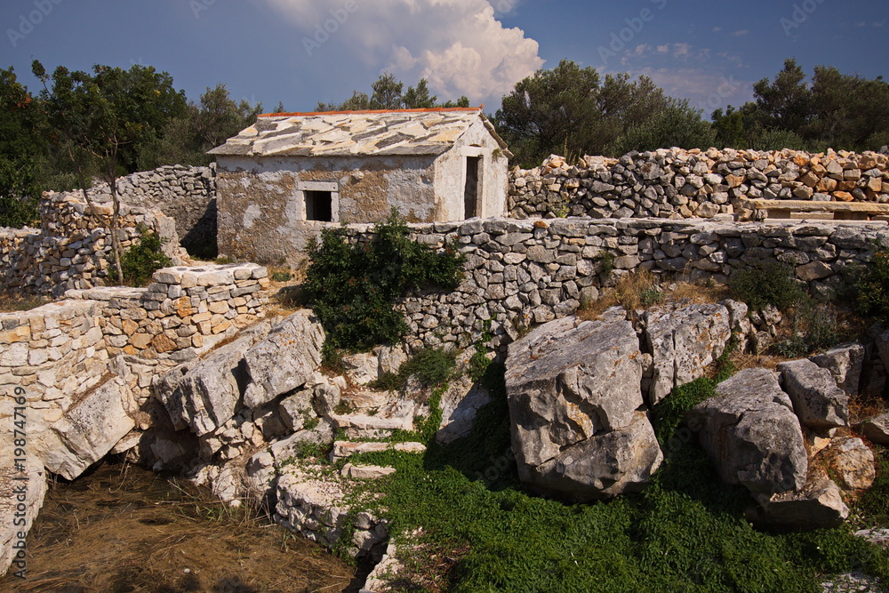 Stone hut at Lake Vransko near Pirovac in Croatia
