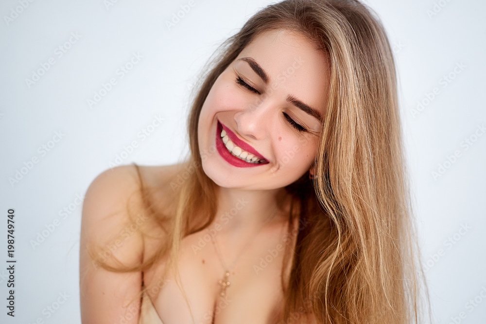 Young beautiful blonde posing at the camera Young beautiful blonde posing at the camera