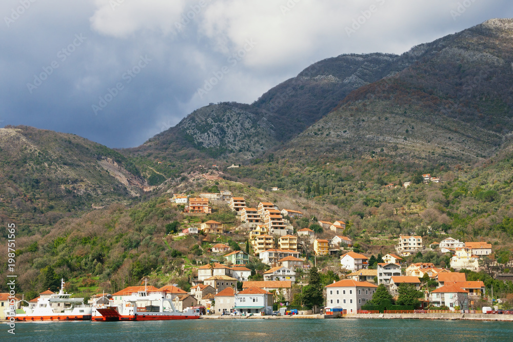 Winter Mediterranean landscape with village on a mountainside.  Montenegro, Bay of Kotor, Kamenari