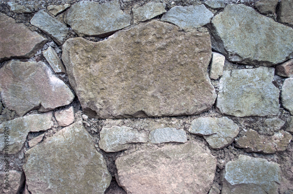 Obraz premium Background grey, rough, stone wall.