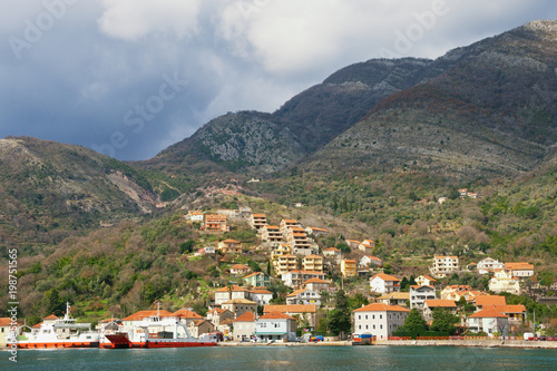 Winter Mediterranean landscape with village on a mountainside. Montenegro, Bay of Kotor, Kamenari