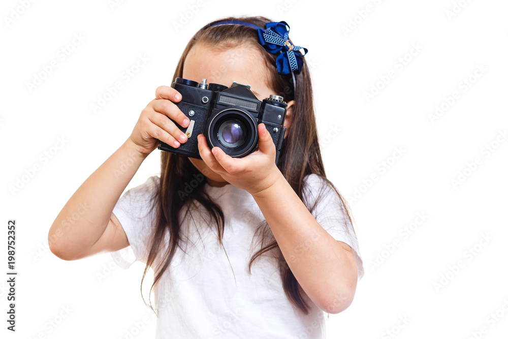Girl taking a picture with a professional retro camera isolated on white Girl taking a picture with a professional retro camera isolated on white