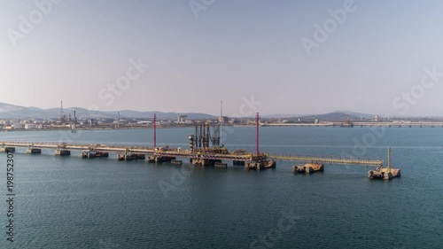 entering the palermos industrial port and shipping harbour shot from a ferry in the early morning, sicily, italy photo