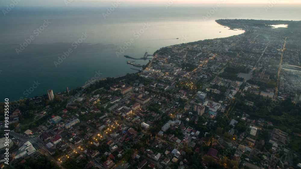 View from a height on the evening landscape of the seaside town.