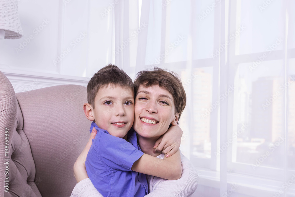 Mother's Day concept: Happy smiling mother and son Mother's Day concept: Happy smiling mother and son